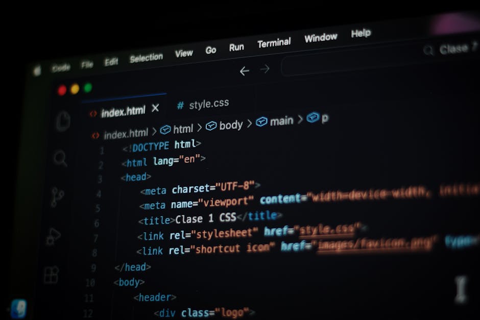 A close-up view of a computer screen displaying HTML code in a code editor. The code includes tags such as <DOCTYPE html>, <html>, <head>, and <body>, with lines of text showin