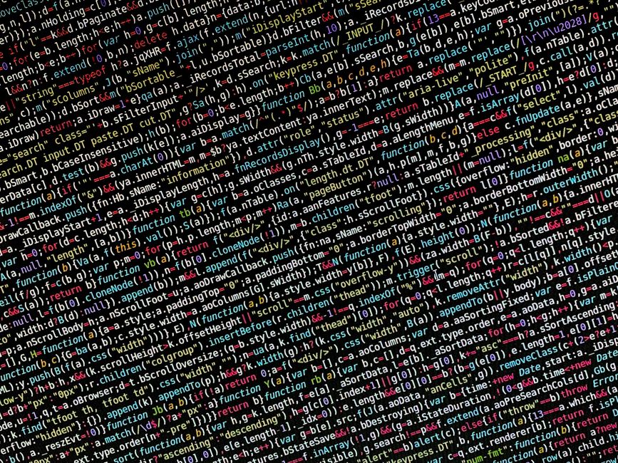 A close-up view of a computer screen displaying HTML code in a code editor. The code includes tags such as <DOCTYPE html>, <html>, <head>, and <body>, with lines of text showin